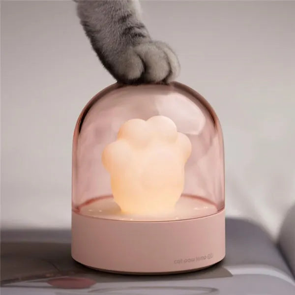 Grey and pink cat paw shaped USB rechargeable night light with musical functions