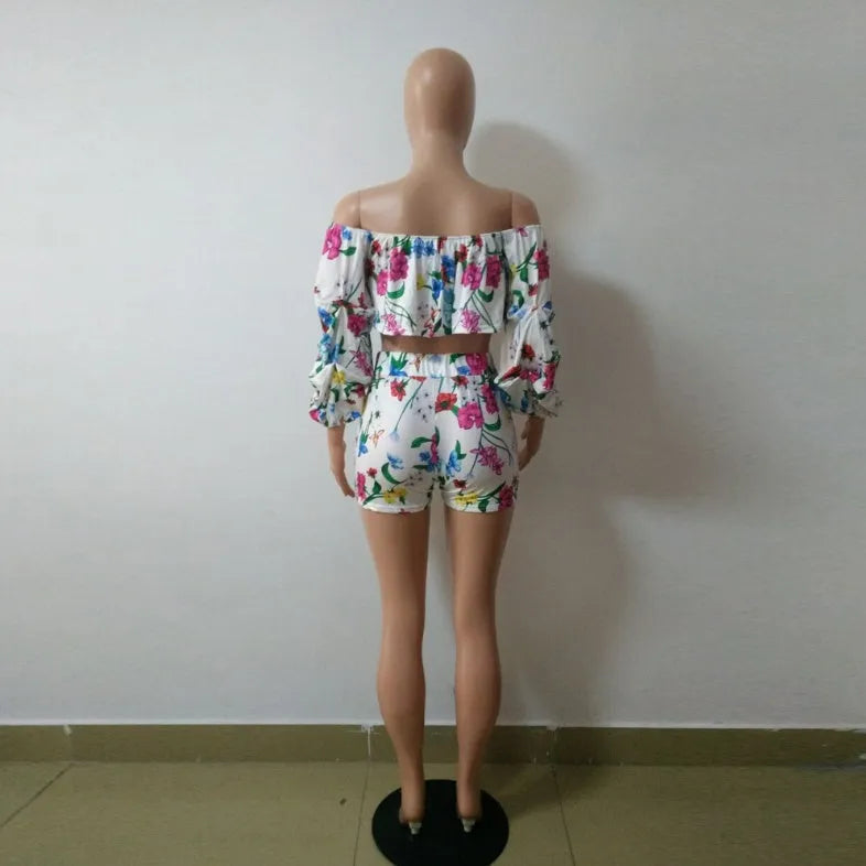 Women's two-piece pyjama set with fleece-lined sleeves and multicolour digital geometric print