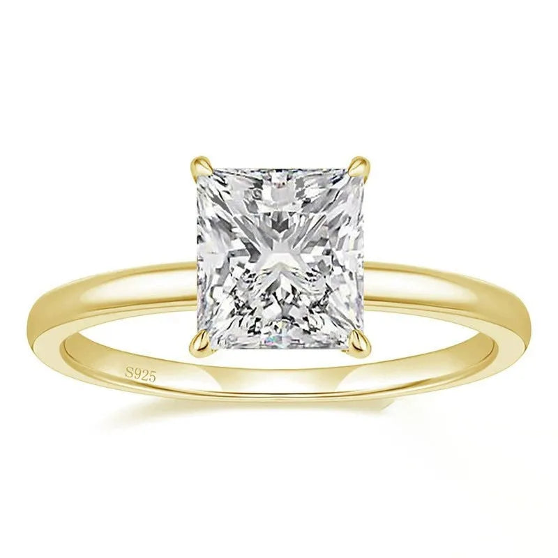 A geometric 925 silver women's ring with a round zirconium stone, shown in gold, rose gold, and silver finishes.