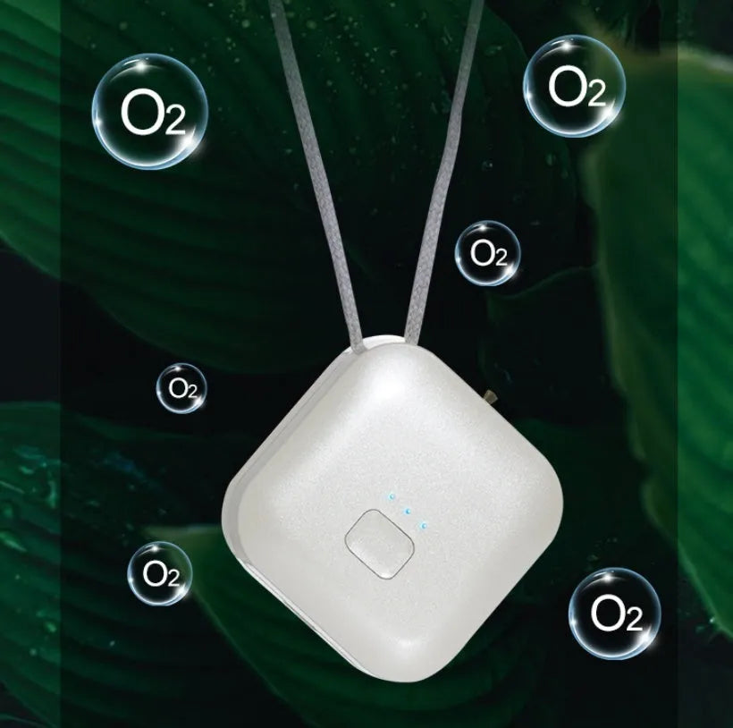 Mini USB portable air purifier necklace in blue, shown next to its charging cable.