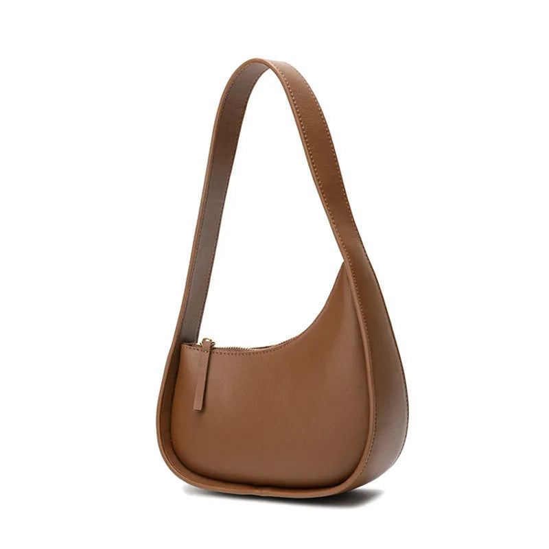 Genuine leather half moon shaped women's handbag with wide shoulder strap in four colour options