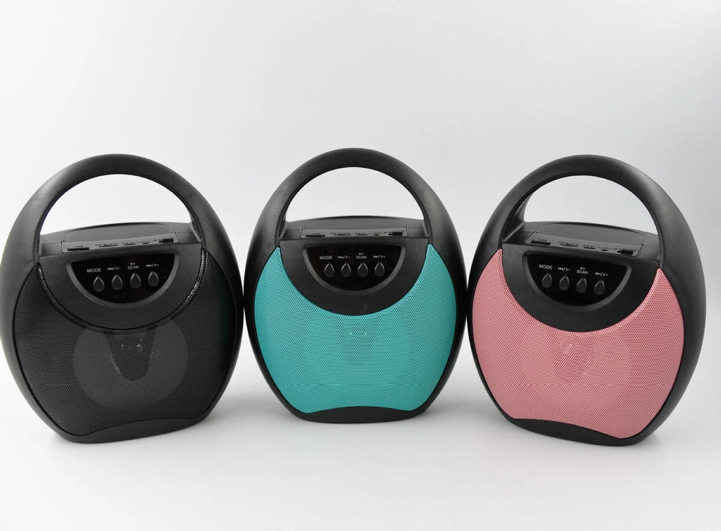 Portable Bluetooth speaker in black, blue, or pink with USB and SD card slots.