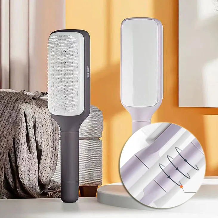 Roland purple self-cleaning hair brush with rotating handle and anti-static massage bristles.