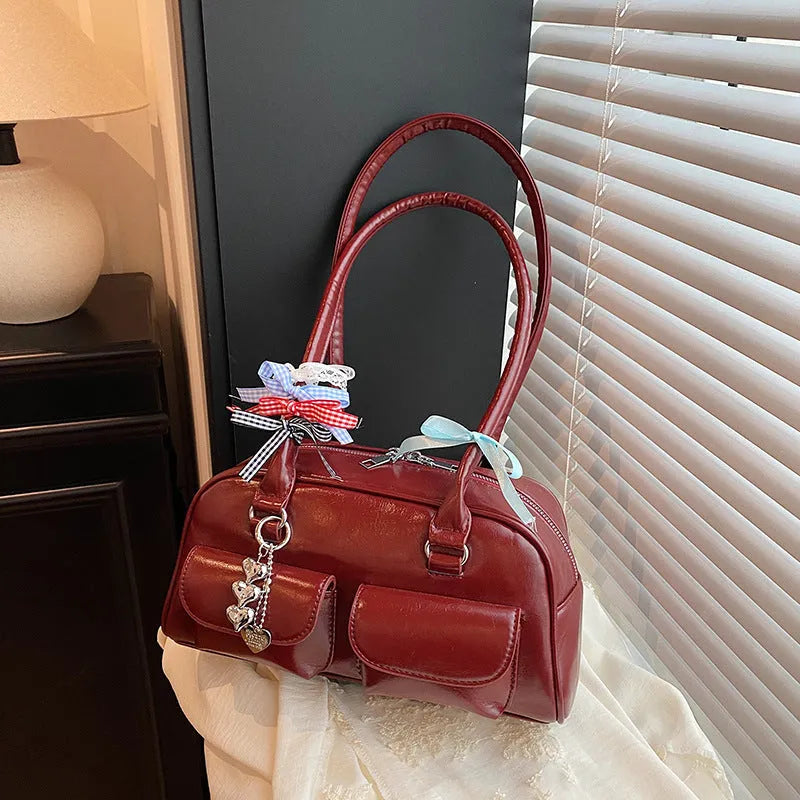 Women's black PU leather retro pillow shoulder bag with double strap and flap closure