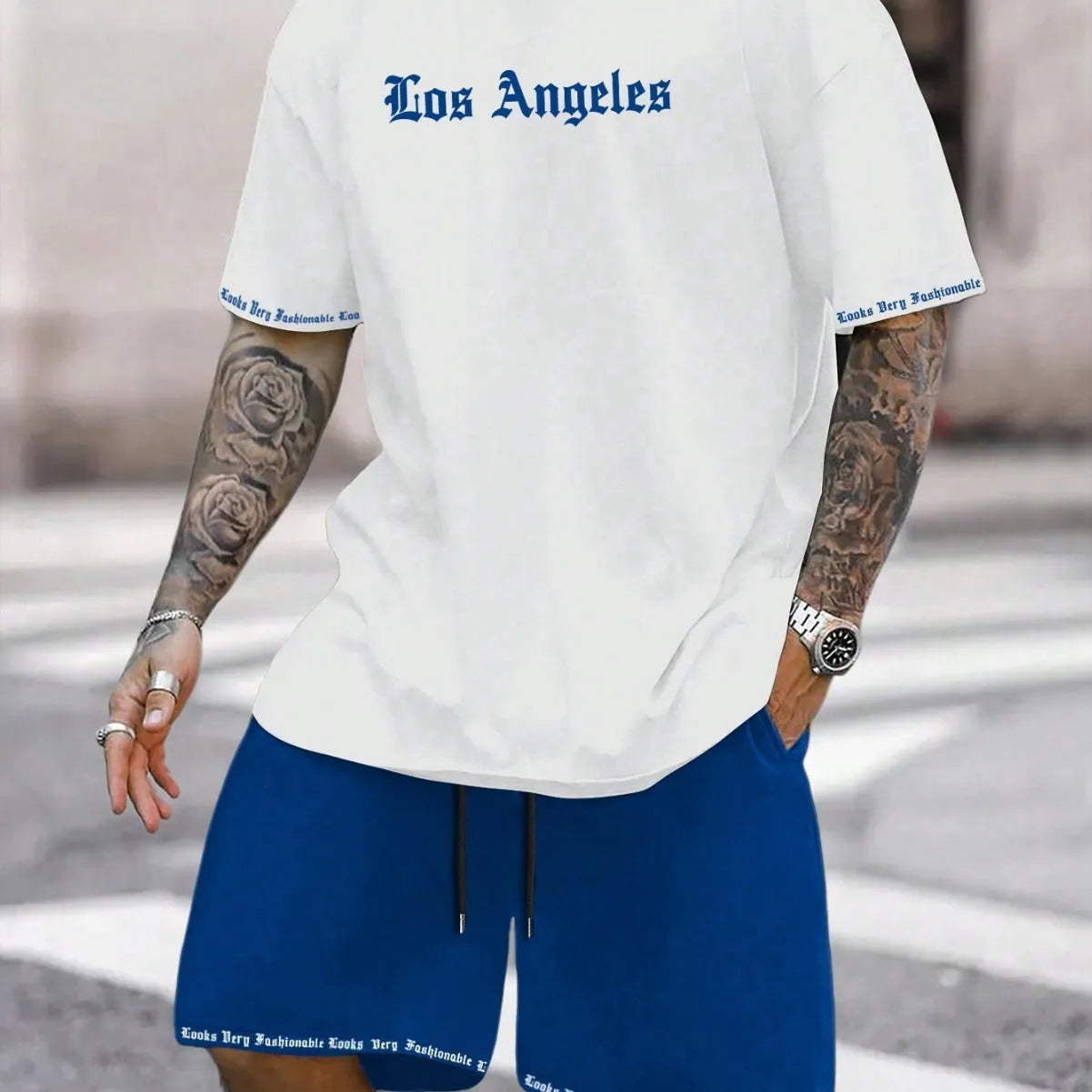 Sports style short sleeve top and shorts set in thin quick-drying fabric, shown in a printed pattern.