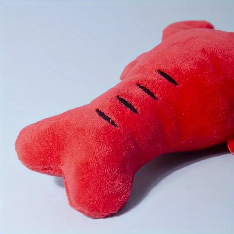 Red lobster stuffed dog toy with squeaker for small and medium breeds measuring 12.5 cm long
