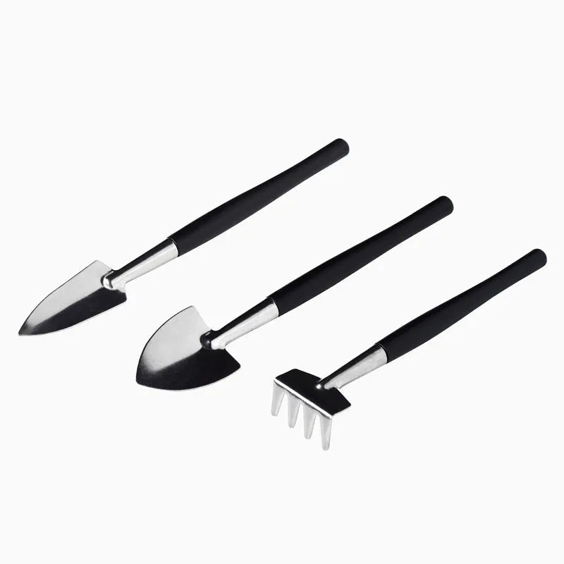16-piece black succulent gardening tools set with cushion showing scissors, tweezers, shovel, rake and spray bottle