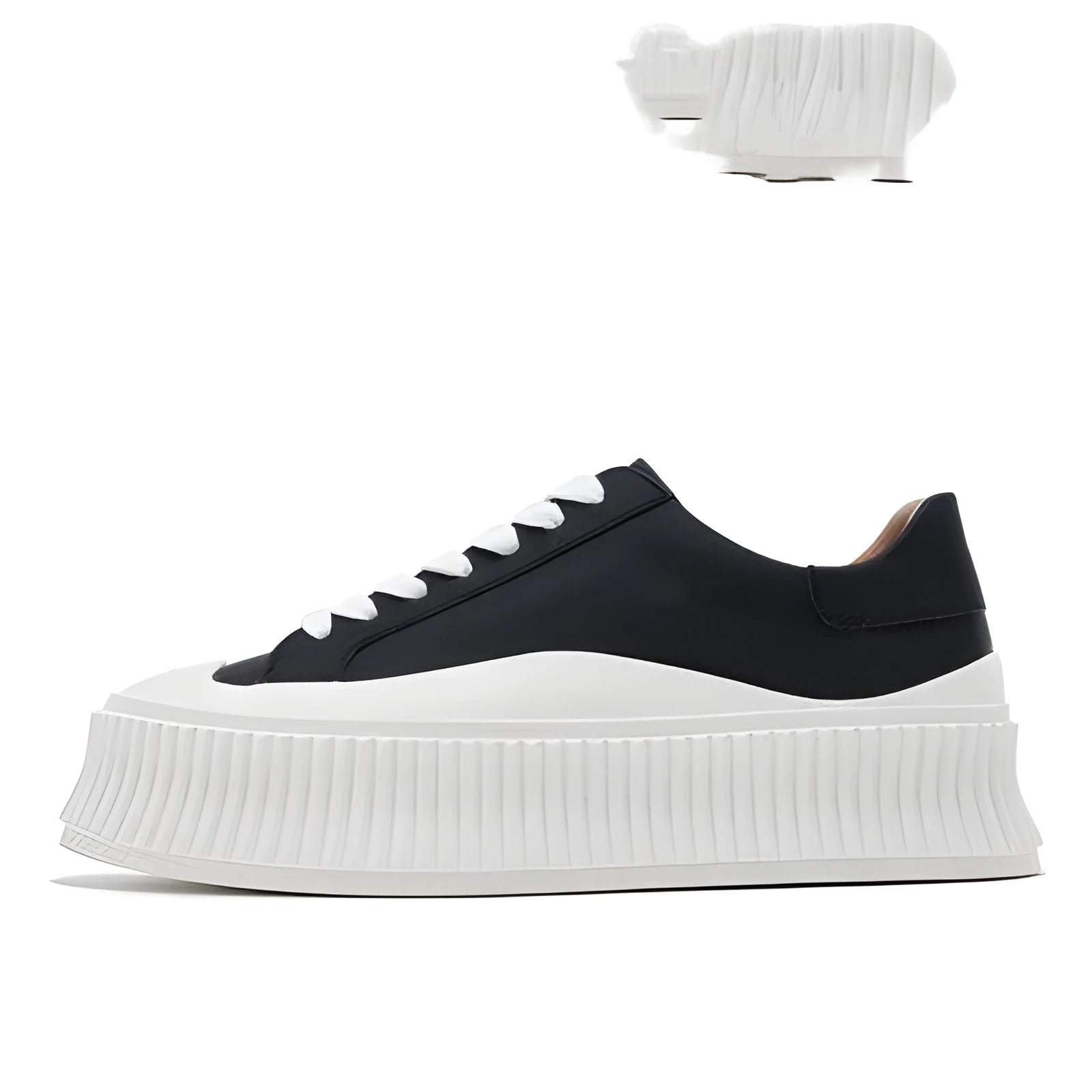 Women's black suede thick sole trainer shoe with back lacing and chunky heel.