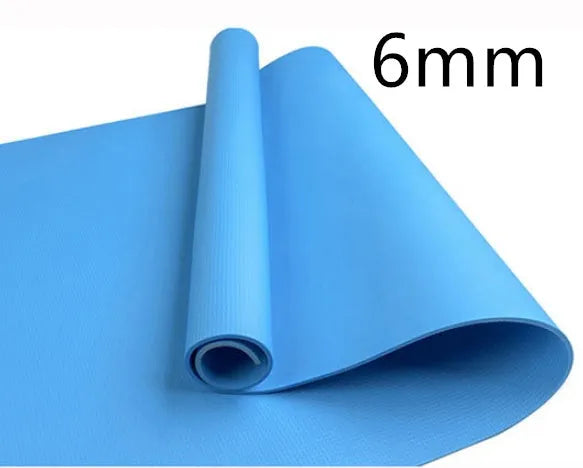 EVA fitness yoga mat in blue, showing its texture and thickness, rolled up with its OPP storage bag.