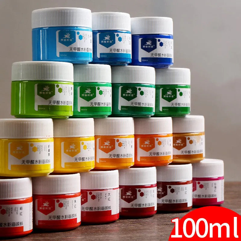 Eight bottled gouache paint colours including black, blue, dark blue, orange, purple, red, sky blue and yellow