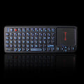 Black wireless mini keyboard with laser pointer and touchpad for presentations
