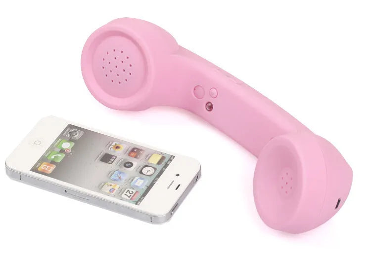 Retro-style Bluetooth wireless headset with over-ear design and microphone, shown in multiple colour options