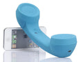 Retro-style Bluetooth wireless headset with over-ear design and microphone, shown in multiple colour options