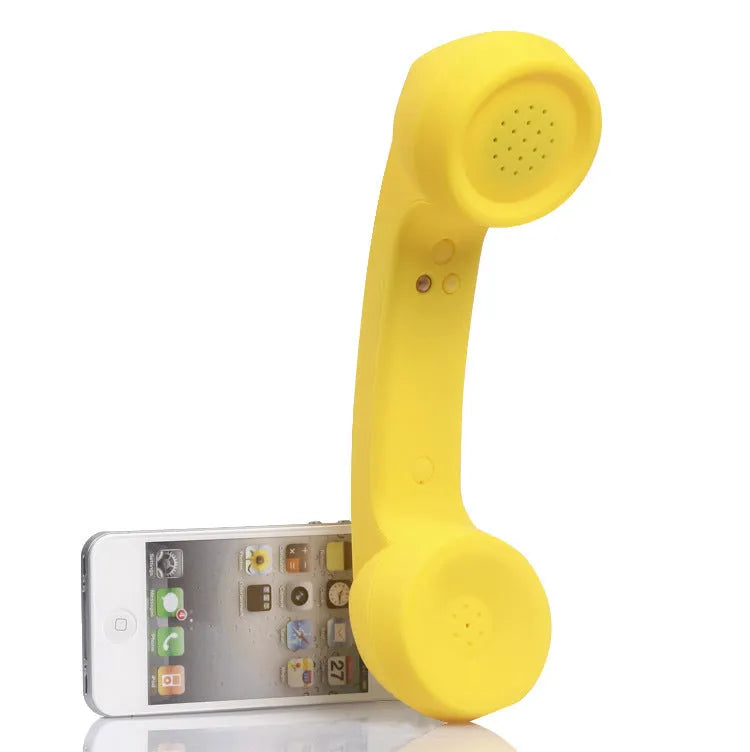 Retro-style Bluetooth wireless headset with over-ear design and microphone, shown in multiple colour options
