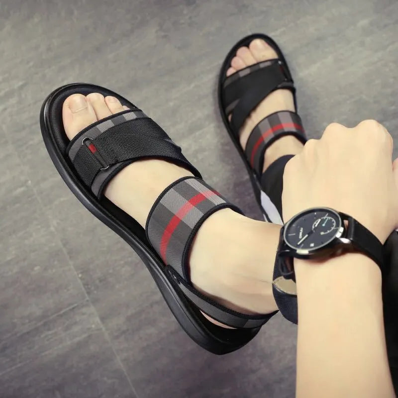Youth leisure sports sandals with a blue Lycra upper and polyurethane sole, shown on a size chart.