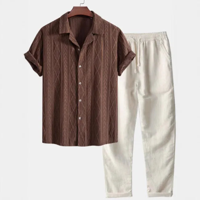 Camouflage printed short-sleeve shirt and trousers casual suit set on a hanger.