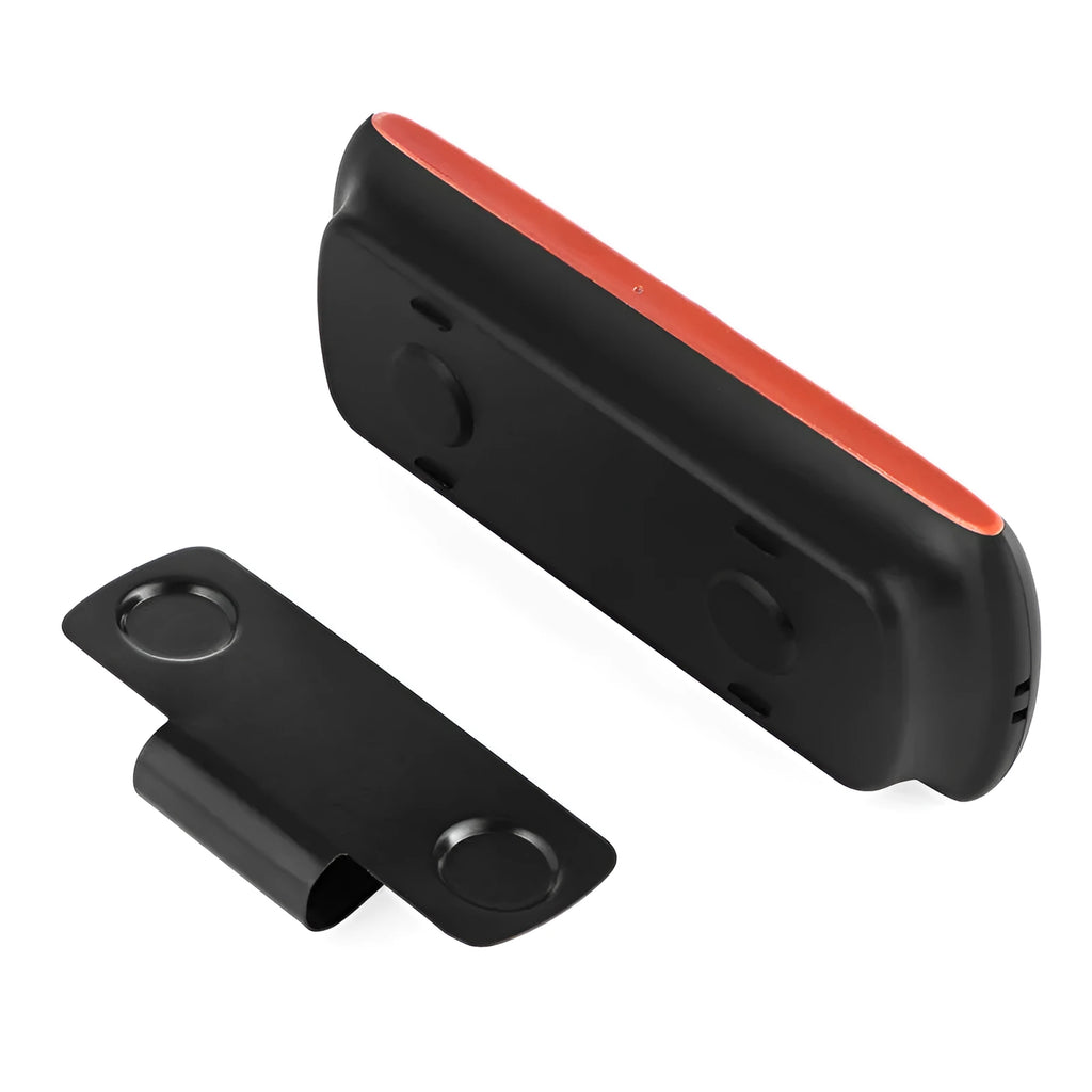 Orange plastic Bluetooth car hands-free kit designed for sun visor mounting.