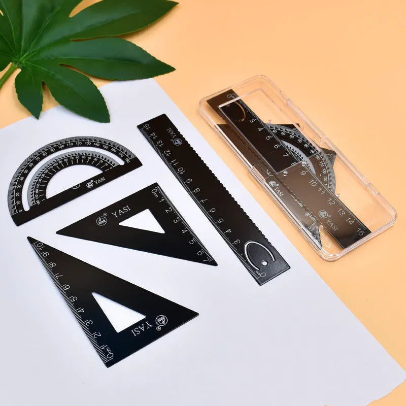 Fraction plate and circle teaching aids kit with magnetic blocks, transparent rulers, and activity corners on a table.