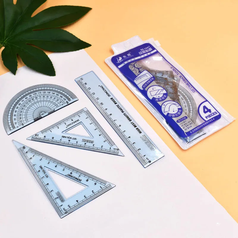 Fraction plate and circle teaching aids kit with magnetic blocks, transparent rulers, and activity corners on a table.