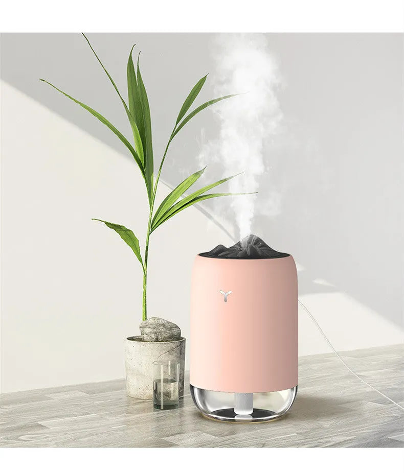 Magic Flame humidifier columnar aroma diffuser in white, blue, or pink with USB cable