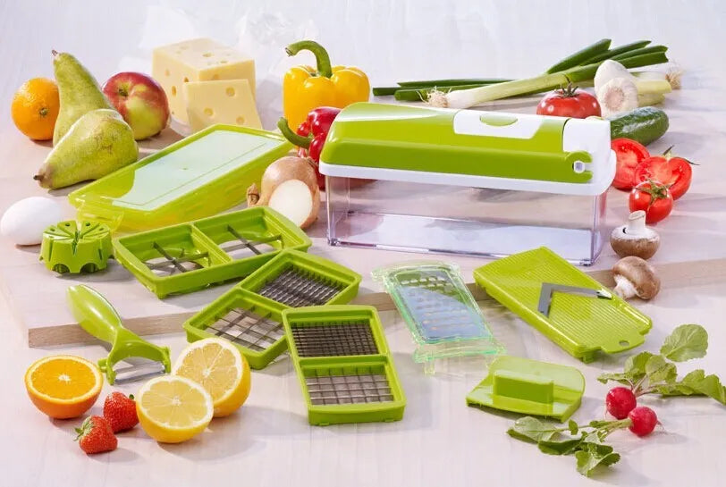 Green 12-piece manual vegetable chopper set with stainless steel blades and multiple attachments
