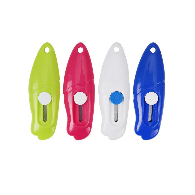 Cartoon-design art knife with plastic and metal construction for manual production