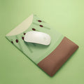 Soft wrist support mouse pad with cloth surface and silicone base, 27cm by 18cm by 2cm dimensions