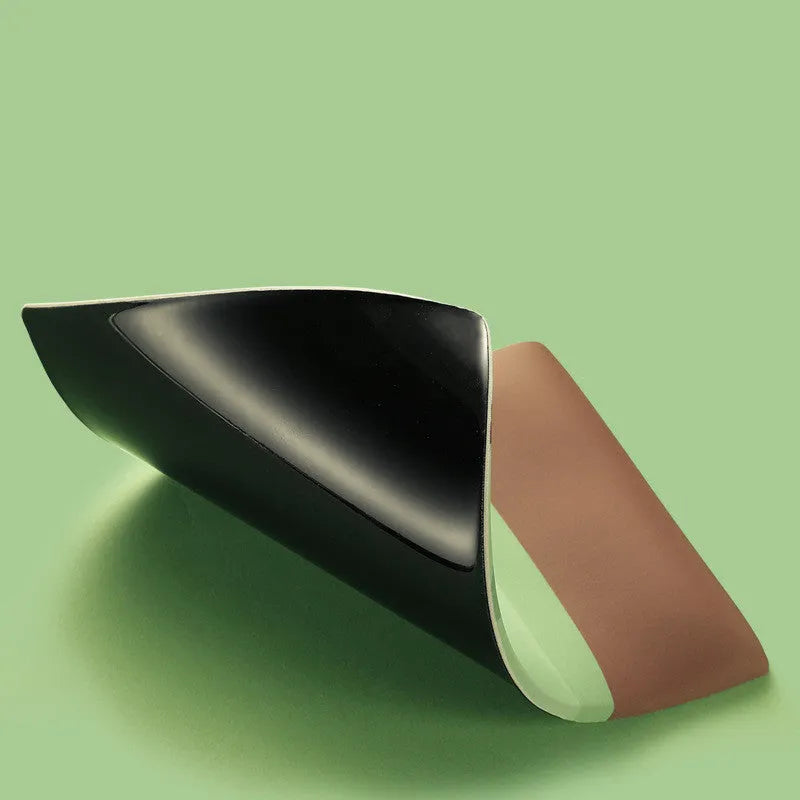 Soft wrist support mouse pad with cloth surface and silicone base, 27cm by 18cm by 2cm dimensions