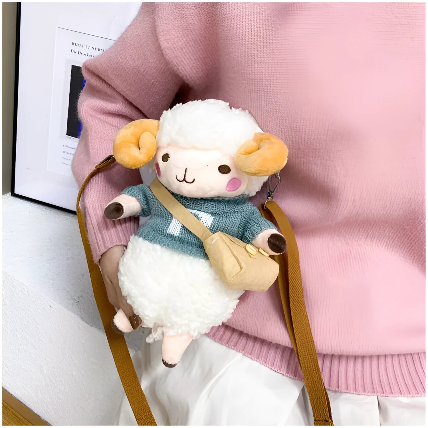 Little Sheep plush crossbody bag showing small square shape, lamb pattern, and colour contrast details
