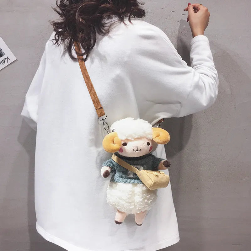 Little Sheep plush crossbody bag showing small square shape, lamb pattern, and colour contrast details