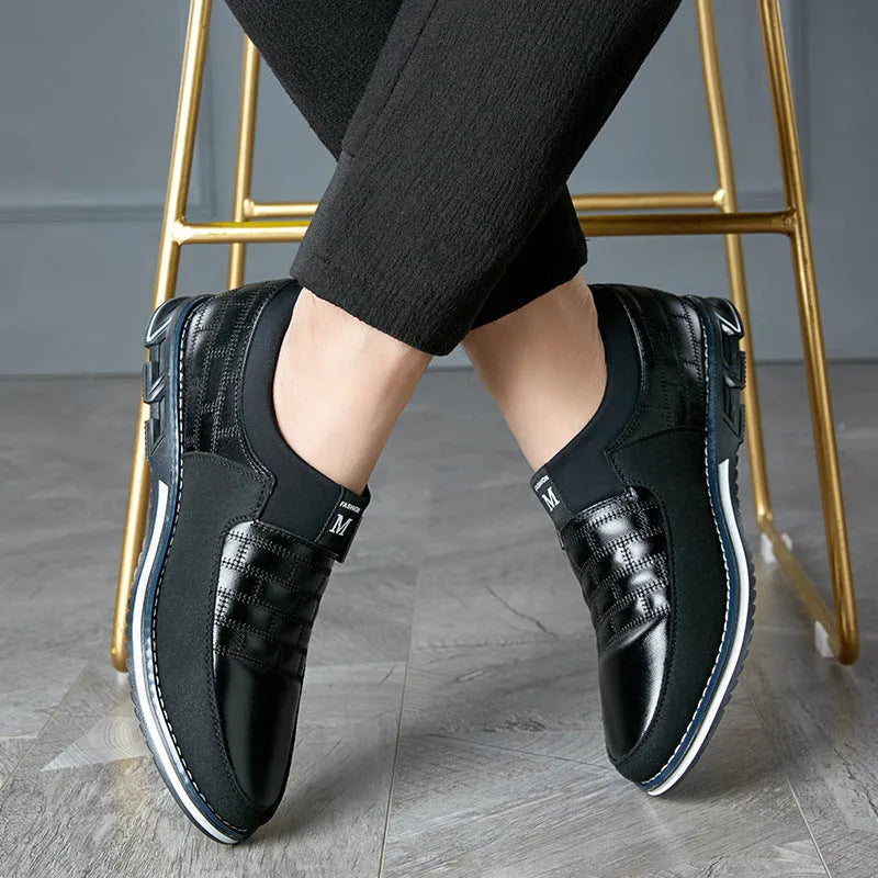Men's large size casual leather shoes in blue, black, and brown colours with low upper design