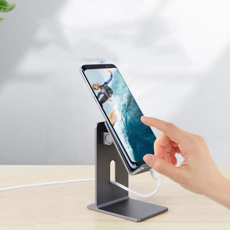 Alloy metal mobile phone holder for desktop use in grey or silver.