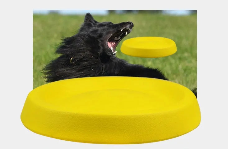 Bright yellow EVA plastic dog throwing toy for fetch and training.