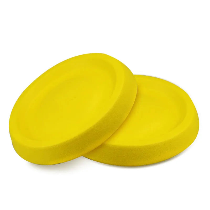 Bright yellow EVA plastic dog throwing toy for fetch and training.