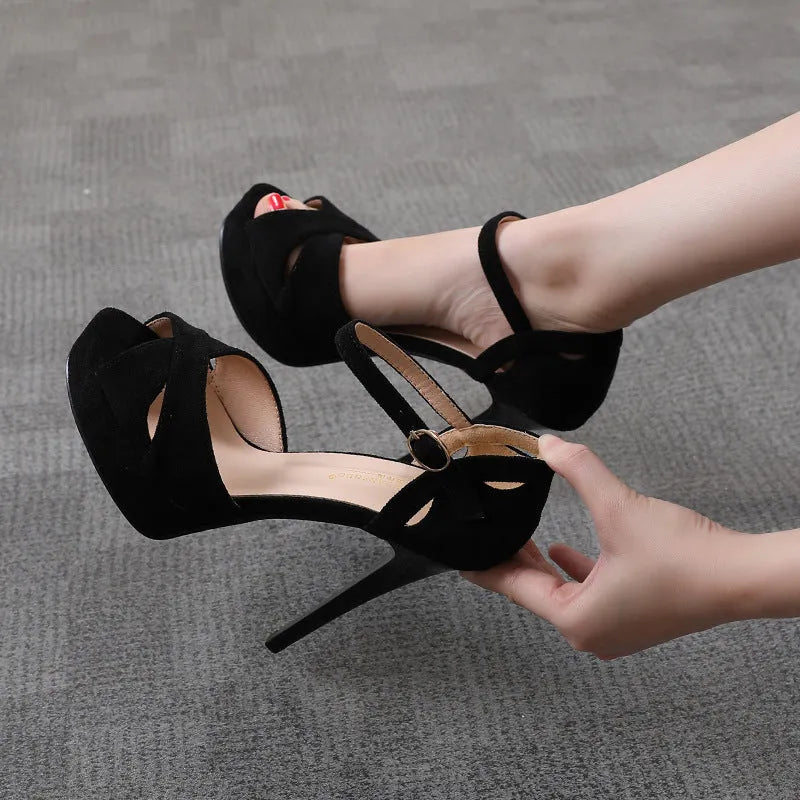 Black women's stiletto platform sandals with fish mouth toe and waterproof sole.