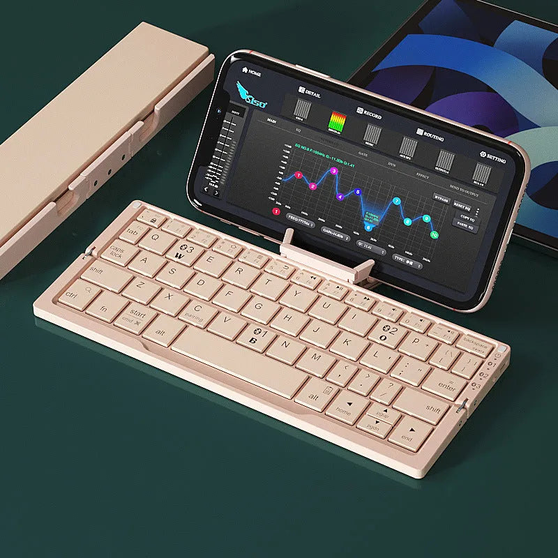 Silver white folding Bluetooth keyboard propping up smartphone with aluminium alloy housing