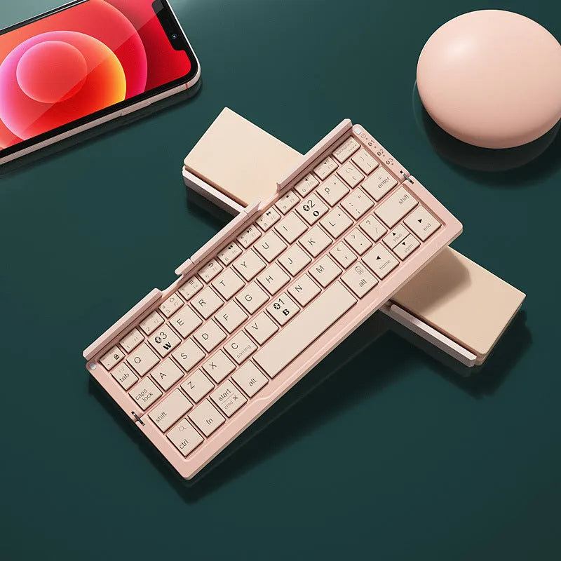 Silver white folding Bluetooth keyboard propping up smartphone with aluminium alloy housing