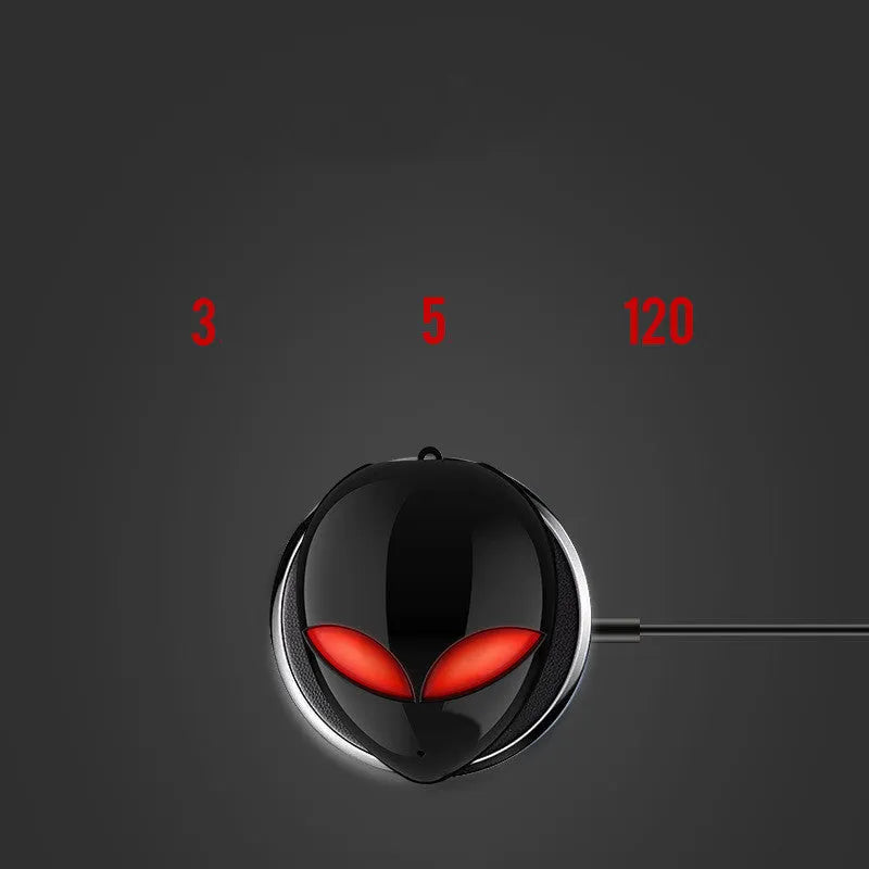 Alien-design T8 Starman Bluetooth headphones in charging case on white background
