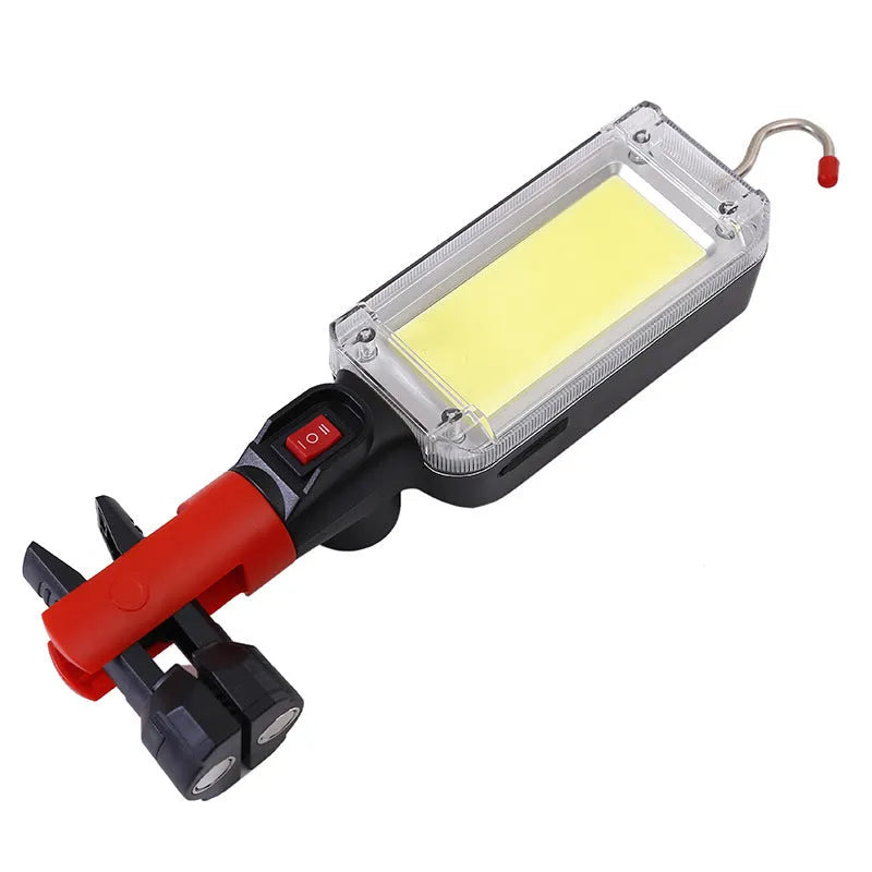 Portable LED work light with magnetic hook showing 700 lumen COB light and USB charging port