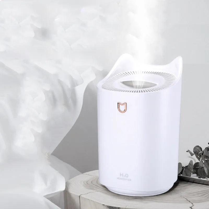 USB-powered double spray humidifier with three fog outlets in coral pink or white colour