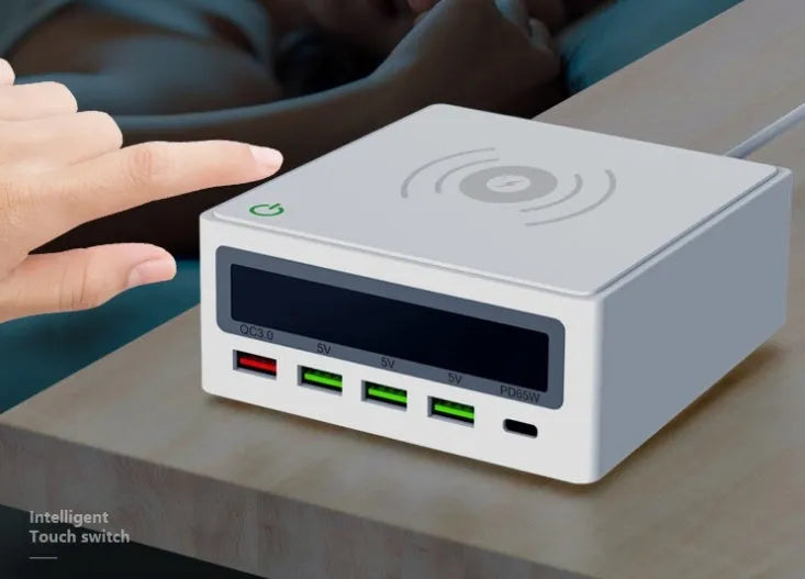 65W multi-port USB laptop charger with wireless charging pad and interchangeable UK US EU Australian plugs
