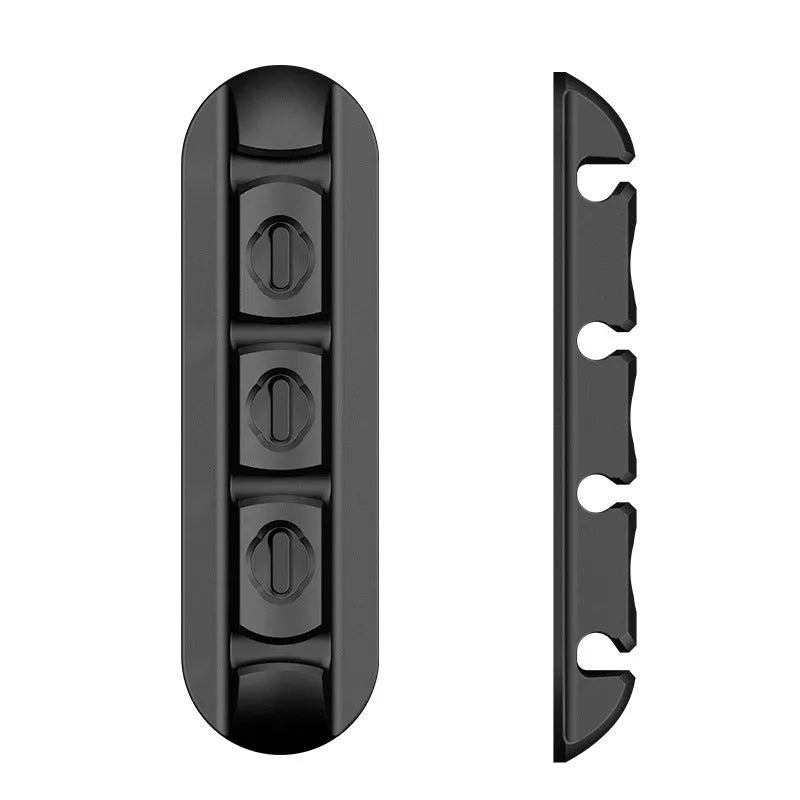 Black soft plastic desktop charging cable organiser with magnetic data cable base