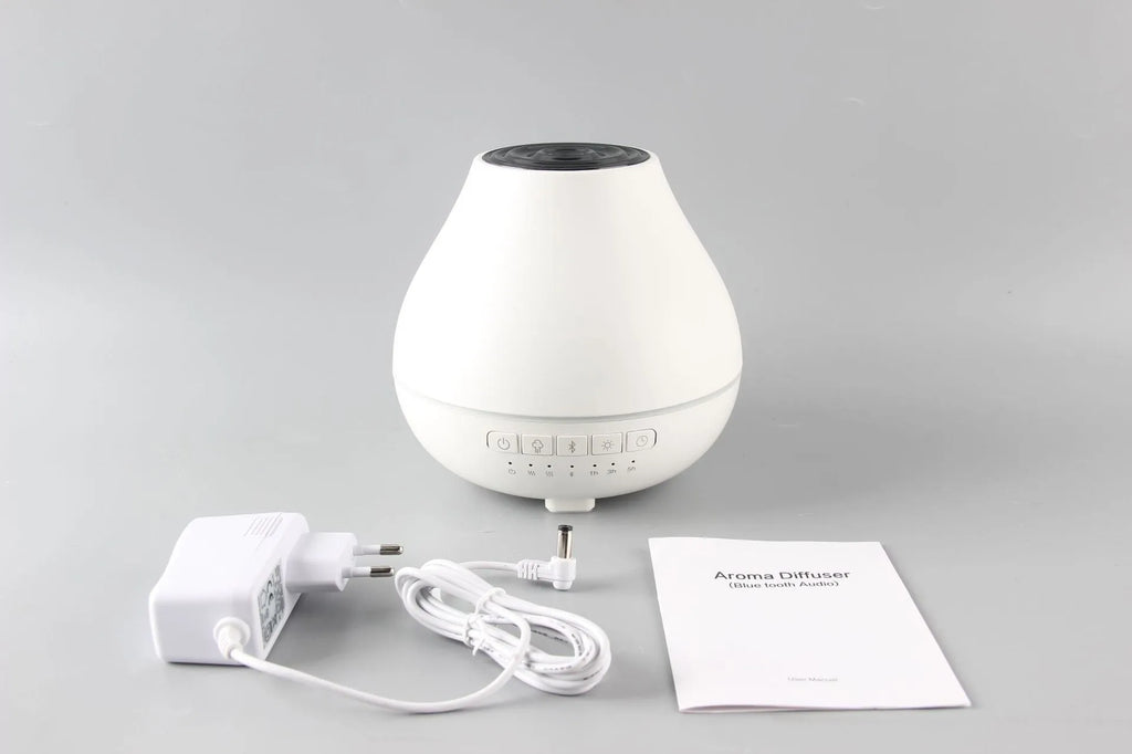 White round Bluetooth aroma diffuser humidifier with night light and essential oil capacity
