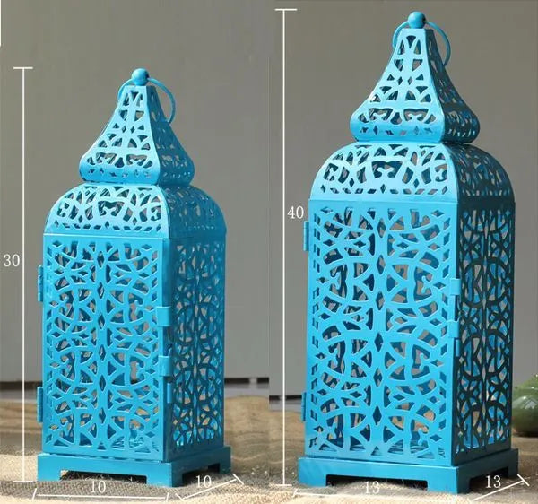Blue Moroccan-style geometric metal candlestick with hollow design for candle display