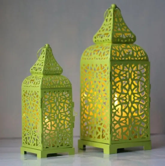 Blue Moroccan-style geometric metal candlestick with hollow design for candle display