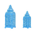 Blue Moroccan-style geometric metal candlestick with hollow design for candle display