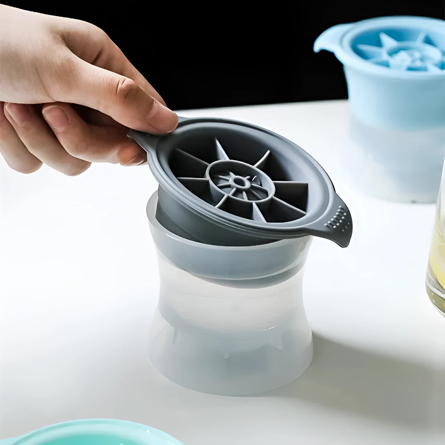 Silicone ice tray producing hockey artifact ice shapes for cocktails in various colour options