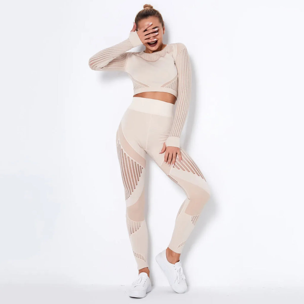 Women's long-sleeved seamless knitted yoga suit in a stripe pattern, shown in navy blue.
