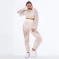 Women's long-sleeved seamless knitted yoga suit in a stripe pattern, shown in navy blue.