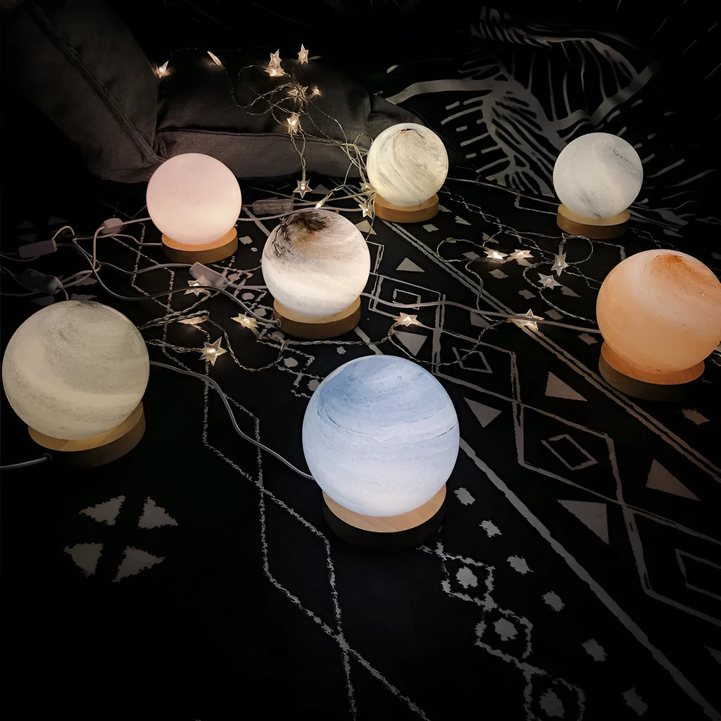 Nordic style bedside table lamp with glass shade on a table.